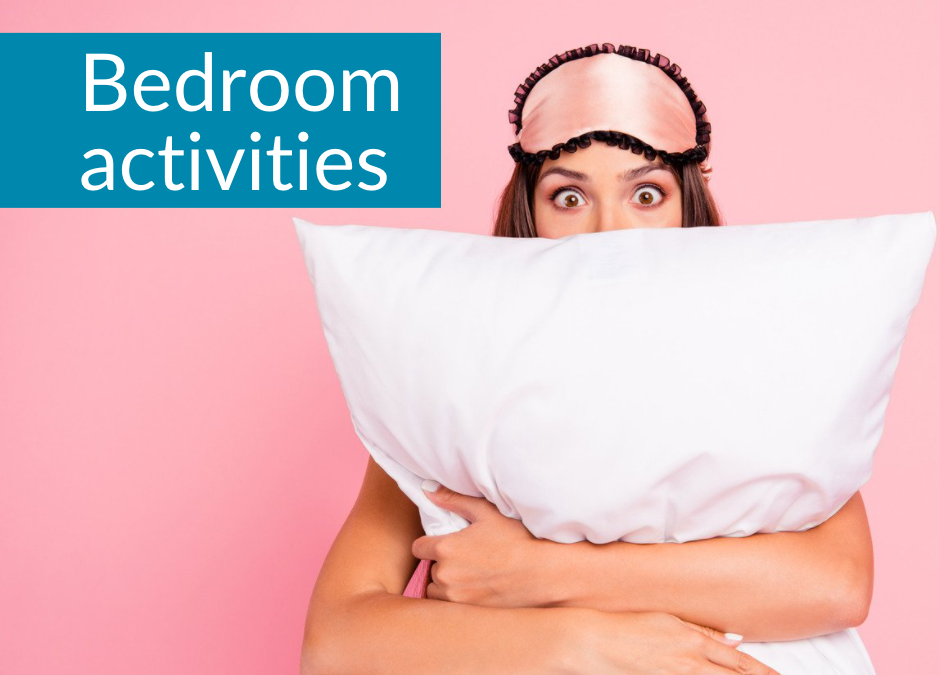 This is an image of a pretty girl cuddling a white pillow. She has a pink sleep mask above her eyes, this mask has a black lace trim. The text in the blue/green block says bedroom activities.
